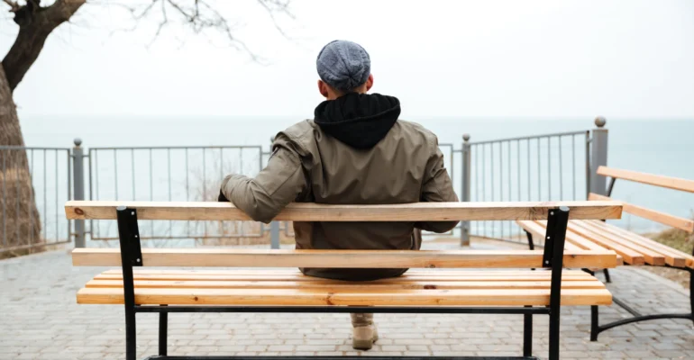 back-view-picture-young-african-man-bench